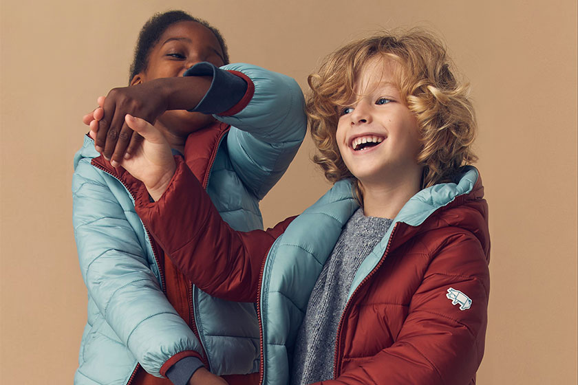 Boy and girl in toastie ecoreversible puffers